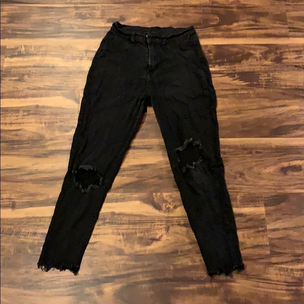 Black skinny ankle jeans with holes